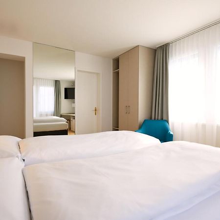 Hotel Schmid & Alfa Бруннен Номер фото